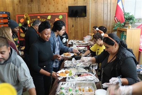 PTO members serving Thanksgiving lunch 